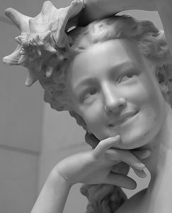 Carpeaux's Girl with Shell - marble nude - black and white detail of face Carpeaux's Girl with Shell - marble nude - black and white detail of face
