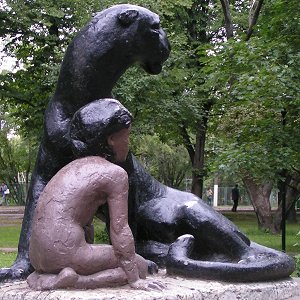 Statue of Mowgli, Priozersk, Russia - Back right, overcast, better condition but still displaying bad surface mottling