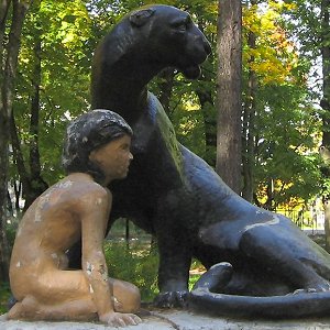 Statue of Mowgli, Priozersk, Russia - Right, sunny, backlit, poor condition